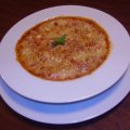 Gnocchi de aipim, ao molho de tomate confit gratinado