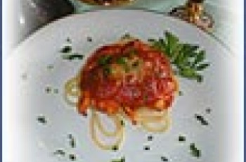 Frango à parmegiana com espaguete